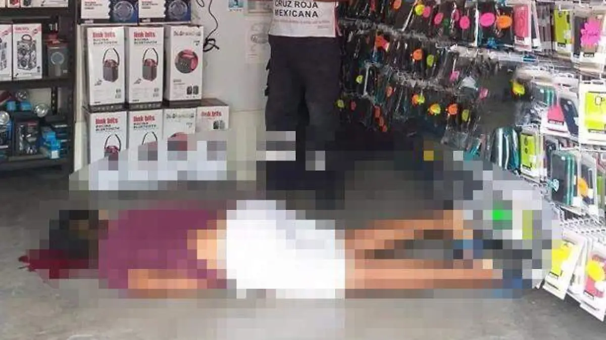 Muerto en Zihuatanejo tienda de celulares